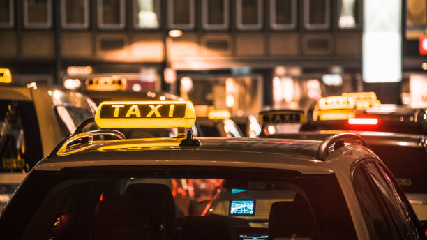 istock Row of taxis at night 1025313726