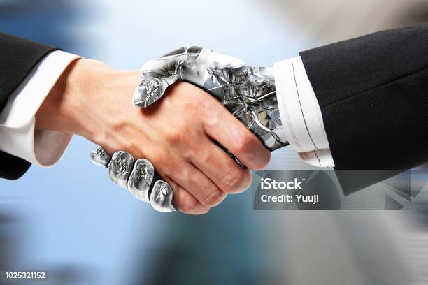 Robot Handshake Stock Photo - Download Image Now - Robot, Handshake, Artificial Intelligence