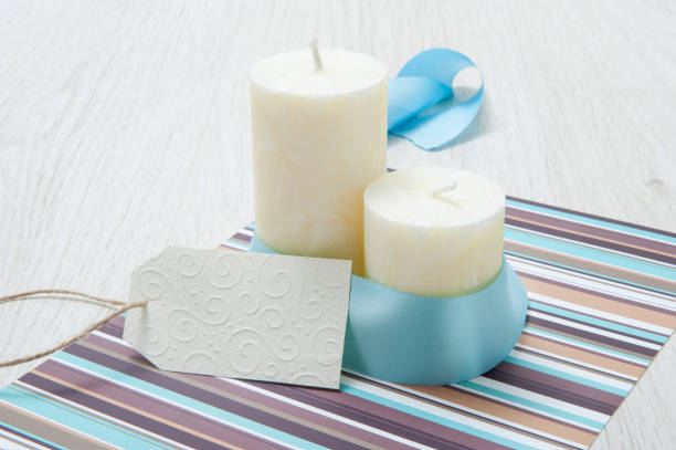 istock background with candles, ribbons and a card 1025329136