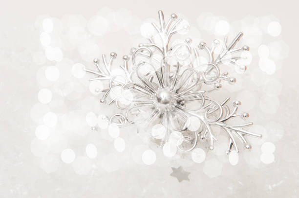 Winter background with snowflakes and highlights