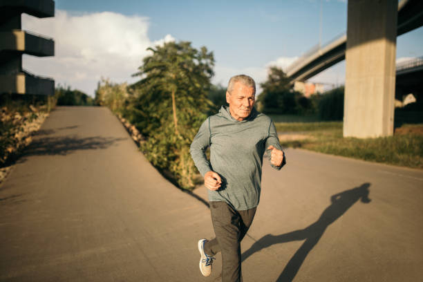 istock Senior jogging in the city 1025347108