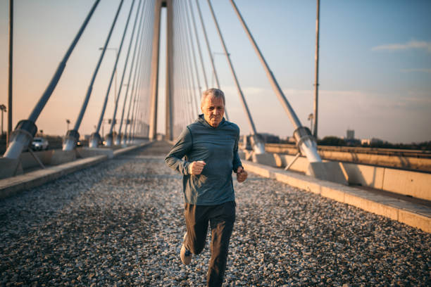 istock Senior jogging in the city 1025347672
