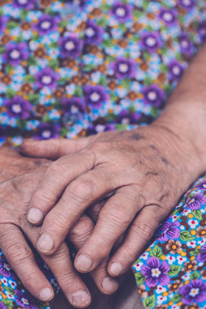 istock Close-Up Of Senior Woman's Hands 1025350074