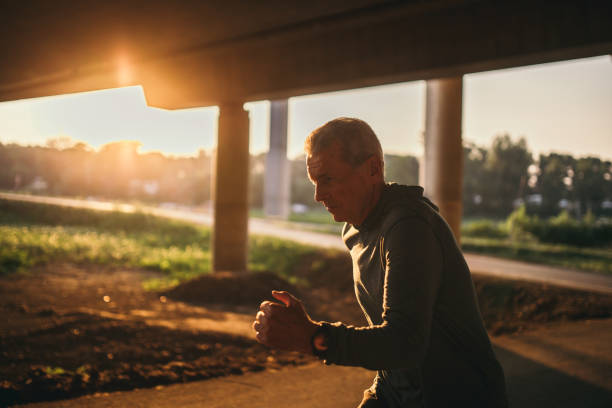 istock Senior jogging in the city 1025350142