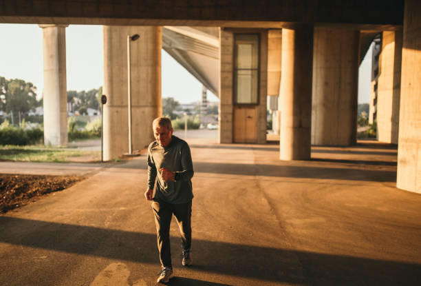istock Senior jogging in the city 1025350180