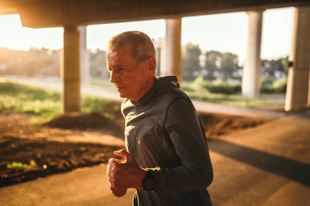 istock Senior jogging in the city 1025350316