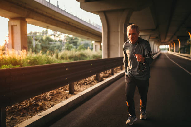 istock Senior jogging in the city 1025350462