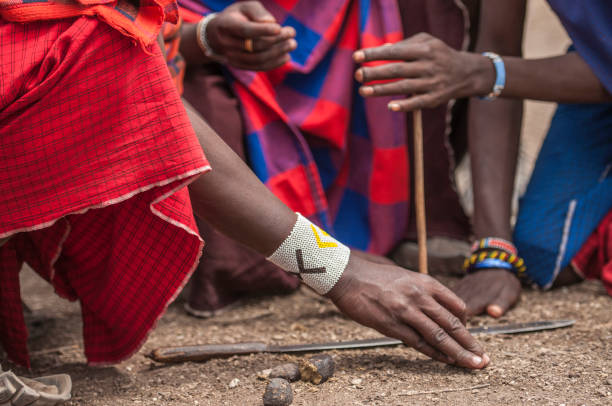 istock tribal bead work worn around wrist by Masai man 1025362628