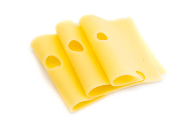 istock Three slices of Emmentaler cheese isolated on white background 1025369508