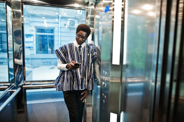 istock African man in traditional clothes and glasses 1025375416