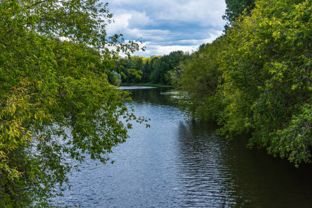 istock Beautiful landscape with a lake and trees 1025387250