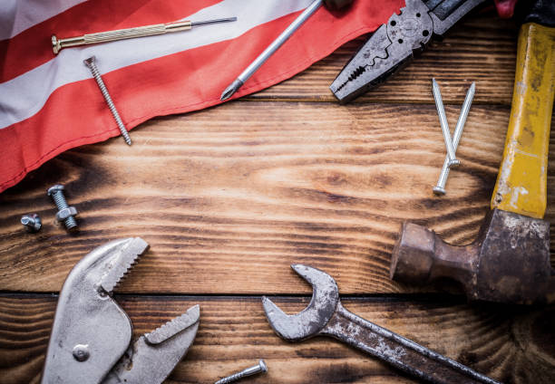 istock Happy Labor day. Construction tools. Copy space for text on wood background. 1025389930