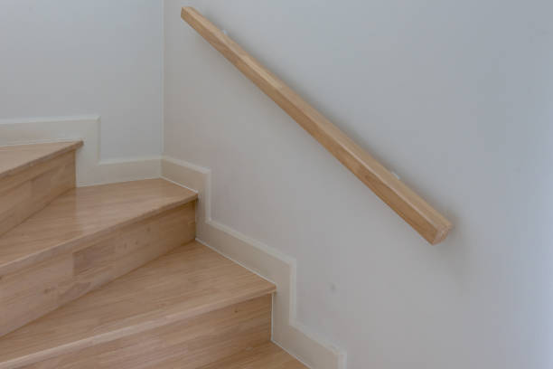 istock wooden staircase interior decoration 1025390114