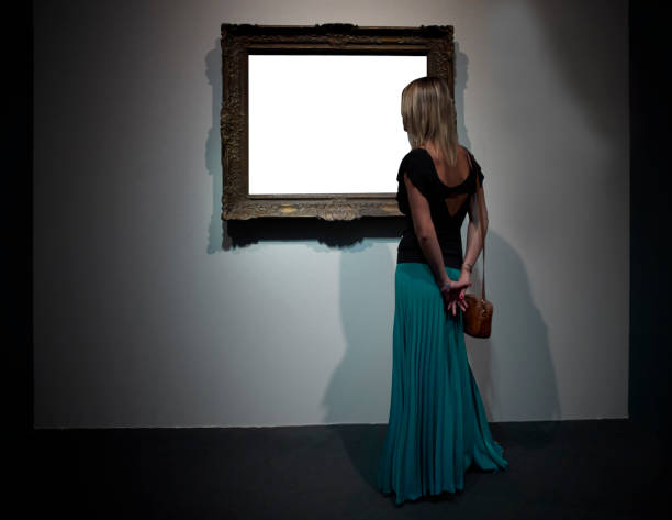 istock Woman in front of an empty frame 1025402190