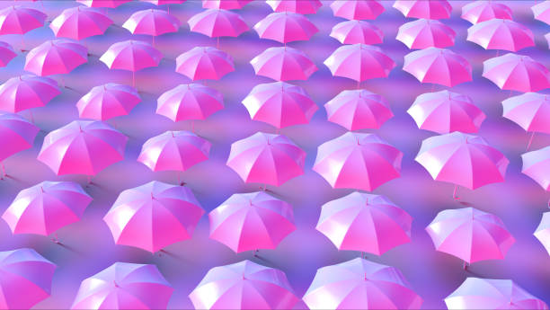 istock Lots of Pink Umbrellas in a Grid Pattern 1025402288