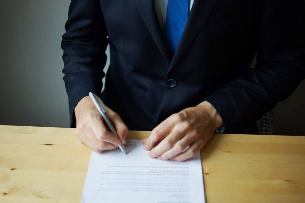 istock Business man signing contract 1025407304