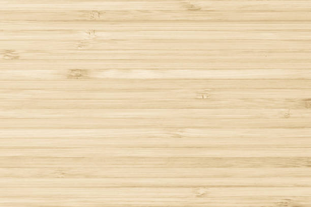 istock Bamboo natural wood texture pattern background in light yellow cream beige brown color 1025411430