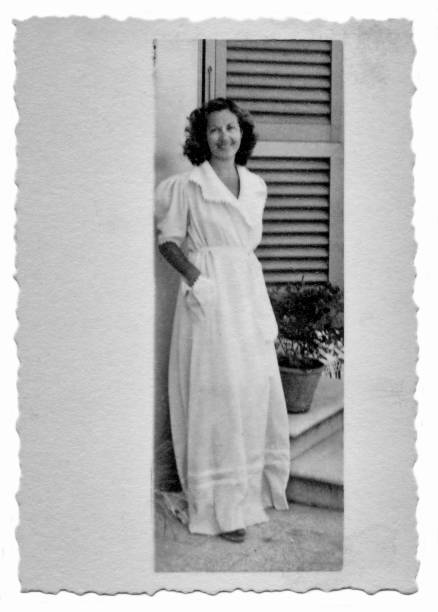 istock 1941 beautiful young woman with dressing gown 1025413780