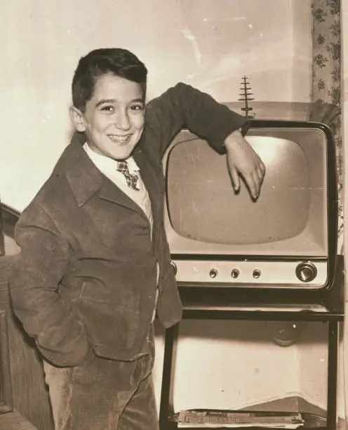 1957 young boy with television