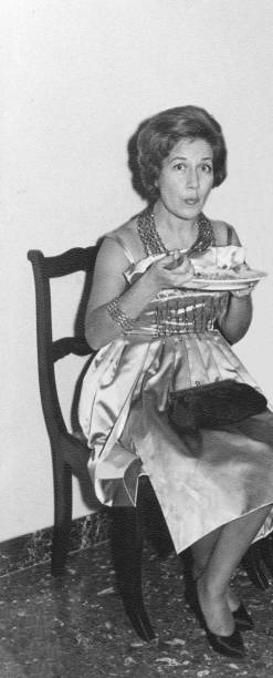 istock 1960 Beautiful woman at a party 1025413792