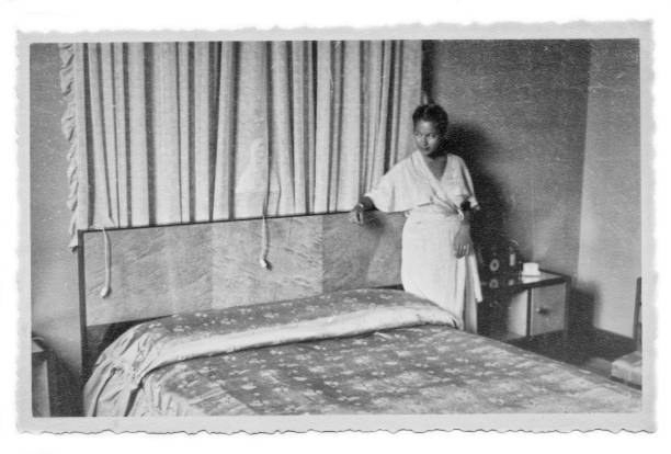 istock 1941 beautiful young woman in a bedroom 1025413794