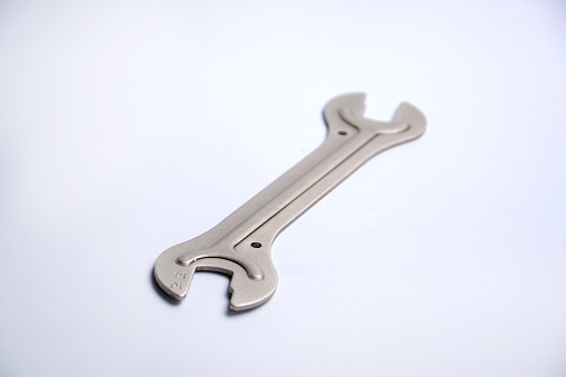 Bike bicyles repair hand tool wrench metal equipment isolated on white background