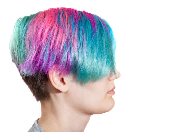 istock female profile with multi colored dyed hairs 1025426088