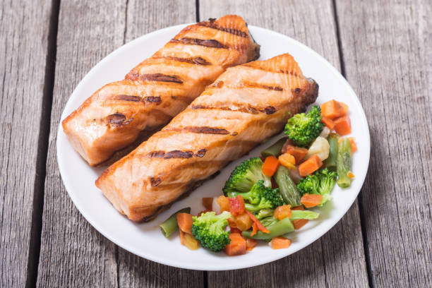 istock Grilled salmon fish with vegetables 1025426422