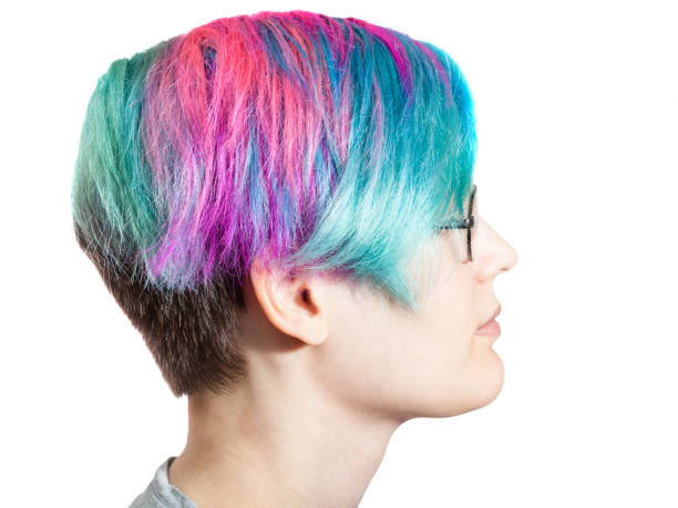 istock woman with glasses and multi colored dyed hairs 1025426888