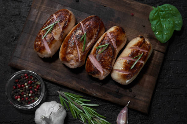 istock Grilled sausages with rye bead and tomatoes 1025427682