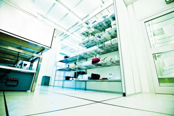 Wide angle image of a semiconductor fabrication cleanroom Lit By High Energy Efficient LED Lamps