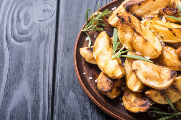 istock Homemade grilled potatoes with rosemary 1025431788