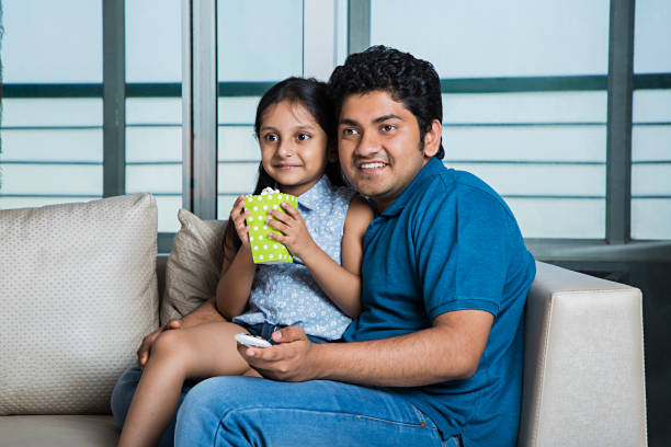 istock Family Film Time - Stock image 1025431920