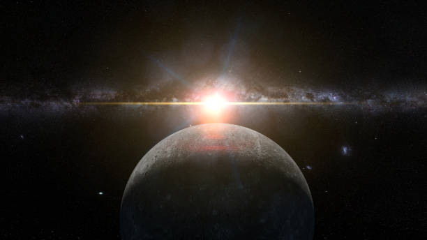 istock sunrise over planet Mercury lit by the Sun and the galaxy 1025432128