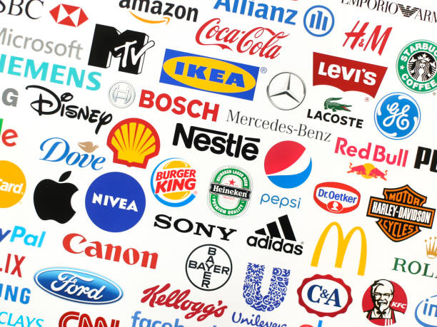 Brands Logotype collection of some of most famous brands in the world on a screen - including Adidas, Nestle, Nike, McDonald's, Sony, Facebook, Ikea, Pepsi and much more printed on quality paper and shot with a high resolution camera. branding identity business merchandise stock pictures, royalty-free photos & images