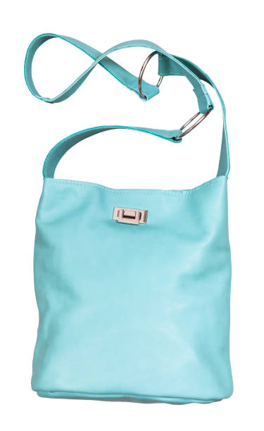istock aquamarine colour leather handbag isolated 1025444578