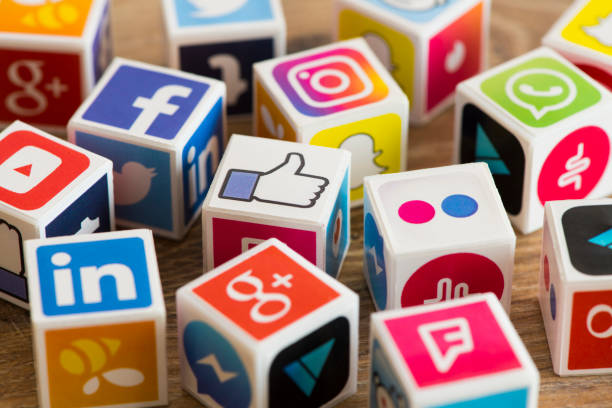 Social media cubes İstanbul, Turkey - August 25, 2018: Plastic cubes with popular social media services icons, including Facebook, Instagram, Youtube, Twitter on a desk. pinterest stock pictures, royalty-free photos & images