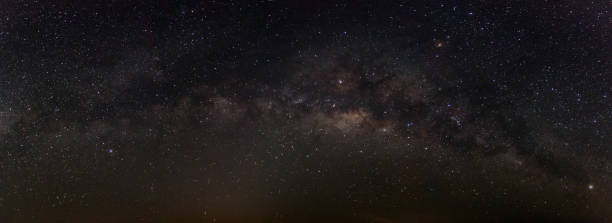 istock Milky way galaxy with stars and space dust in the universe. 1025473478