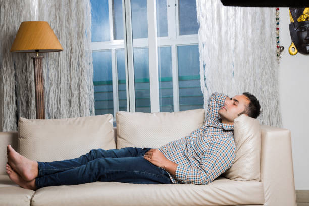 istock Indian guy daydreaming - Stock image 1025474124