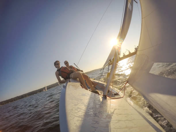 istock Couple friends sailing 1025477234