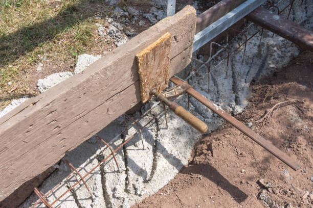 istock Concrete foundation with iron reinforcement and wooden formwork 1025480750