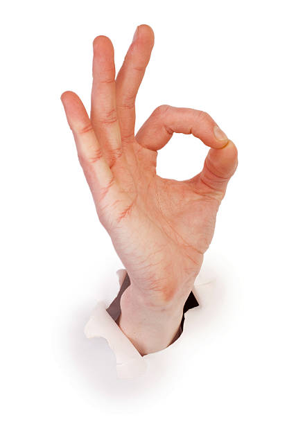 istock Gesture male hand through white paper 102549758