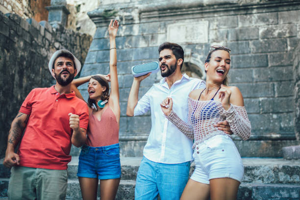 istock Young happy tourists sightseeing in city 1025504872