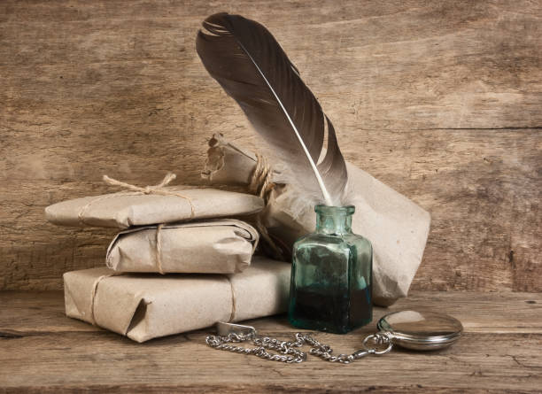 istock letter and a quill in the inkwell 1025504878