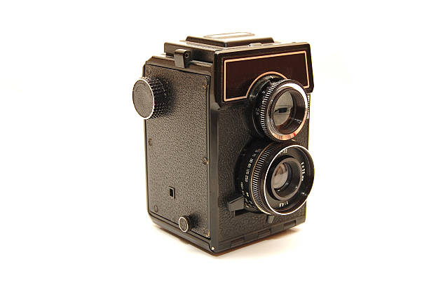 istock Old photo camera isolated over white 102550985