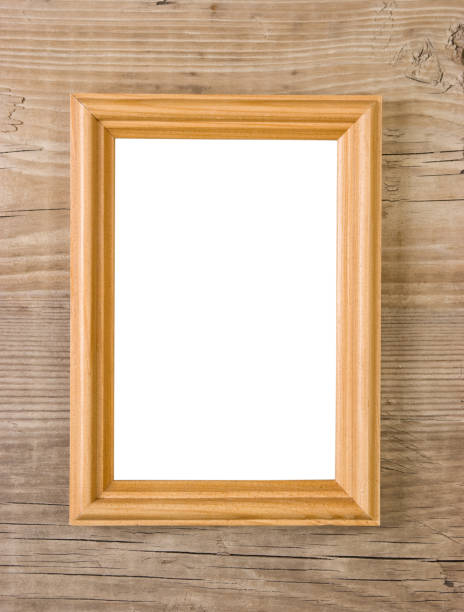 istock old picture frame on a wooden background 1025525572
