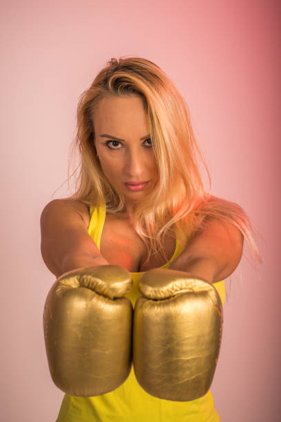 istock Woman with boxing glows 1025565414