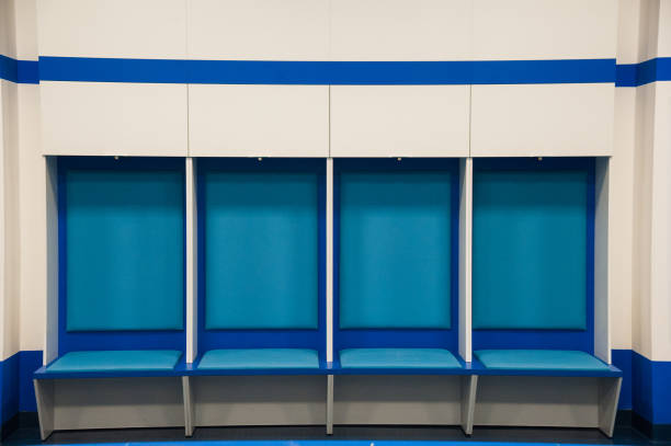 Empty football changing room Empty football changing room at the stadium locker room stock pictures, royalty-free photos & images
