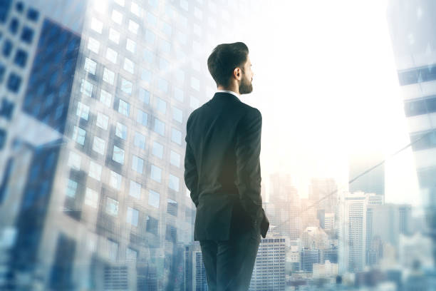 istock Businessman looking at city 1025575488