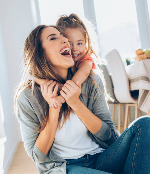 istock Mother and daughter playing 1025583776